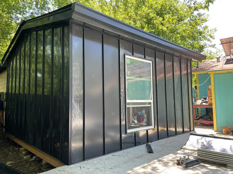 Black standing seam metal wall panels for Roof Inspection in Shoreline